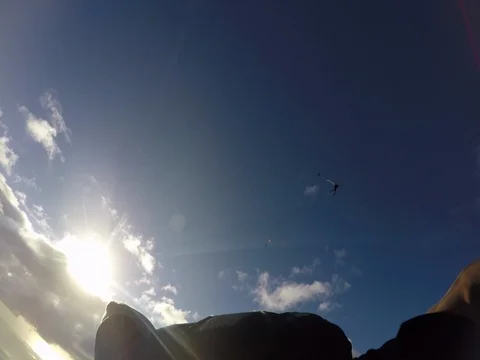 Skydiver Flies Over Cloudy Sky 2 Stock Footage 79734852