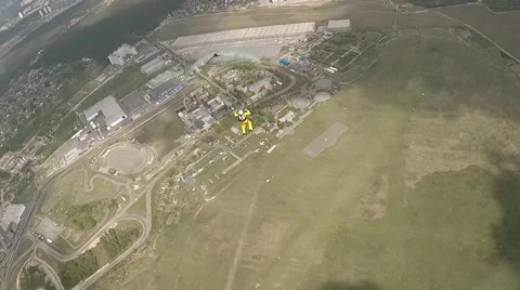 Skydiver is flying on a parachute Stock Footage 57667121