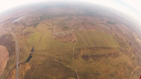 Skydiver flying in sky in evening above fields. Height. Landscape. Parachuting Video stock 96448383