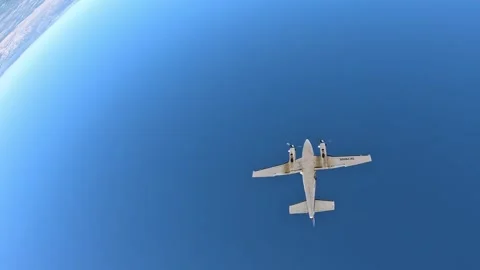 Skydiver is jumping out of a plane. first person view Stock Footage 292744998