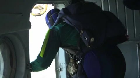 Skydiver jumps from the helicopter 動画素材 53234077