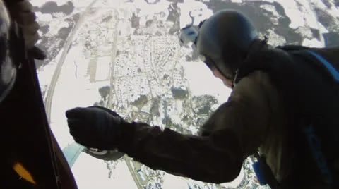 Skydiver jumps out of plane 2 Stock Footage 26650732
