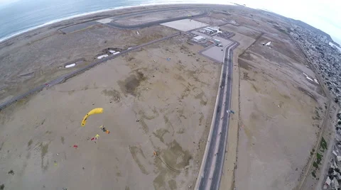 Skydiver is landing on parachute Stock Footage 60840344