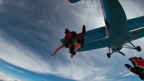 Skydiver open his parachute. From high speed to stop. Stock Footage 155118928