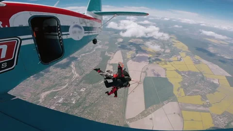 Skydiver open his parachute. From high speed to stop. Stock Footage 155118975