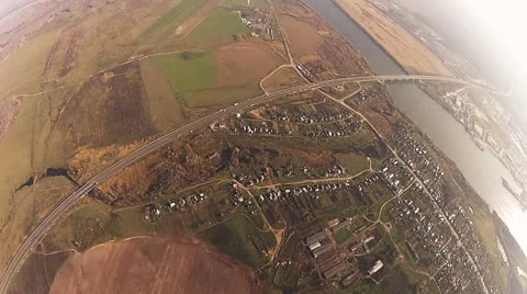 Skydiver parachuting in cloudy sky in evening. Extreme sport. Landscape. Uniform Stock Footage 66747893