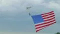 Skydiver Parachuting With Flag 02 HD Footage