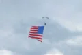 Skydiver Parachuting With Flag 02 Footage