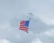 Skydiver Parachuting With Flag 02 SD Footage