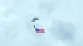 Skydiver Parachuting With Flag HD Footage
