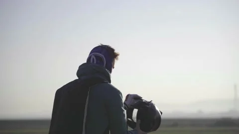 Skydiver Preparing For Skydive Jump, Puts Helmet On Head Stock Footage 170918104