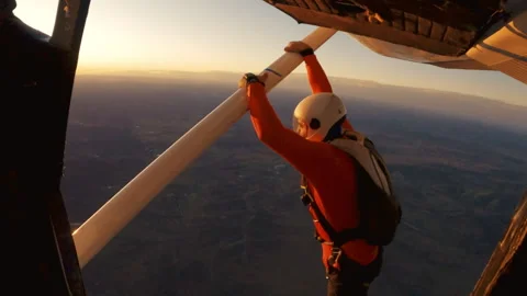 A skydiver ready to jump Stock Footage 264504878