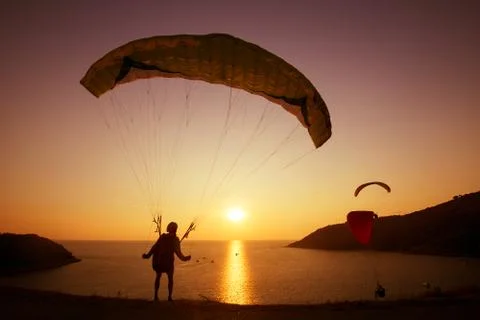 Skydiver skydiving group sunset concept Stock Photos