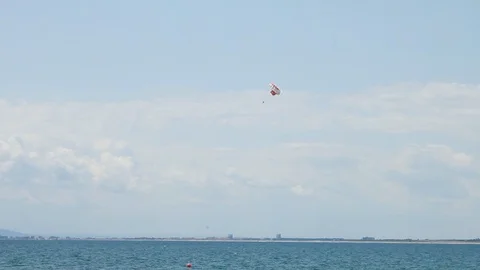 Skydiver soars over the sea Stock Footage 115270652