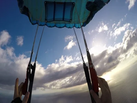Skydiver Under Parachute Flying Over Island 스톡 동영상 79734714