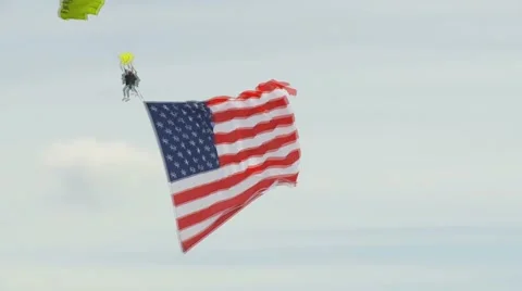 Skydiver with U.S. flag Stock Footage 1038722