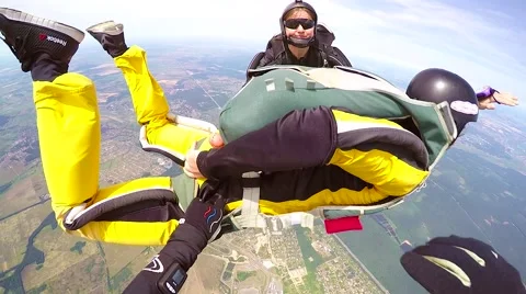 Skydivers in an accelerated free fall, editorial Video stock 68773471