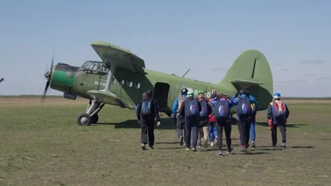 Skydivers approach the plane to take off Stock-Footage 294103761