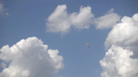 Skydivers on a background of a cloudy sky Stock Footage 95343348