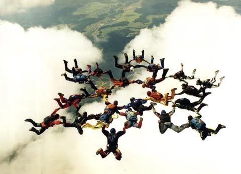 Skydivers on the cloud Stock Photos