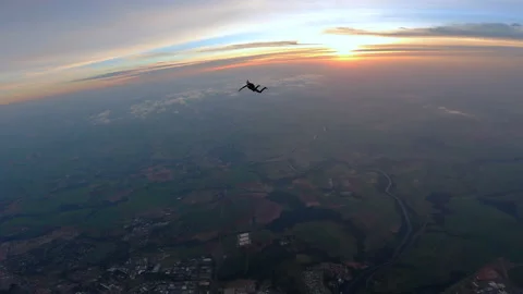 Skydivers having fun at the sunrise. Stock Footage 154423286