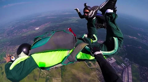 Skydivers jump out of airplane Stock Footage 69070139