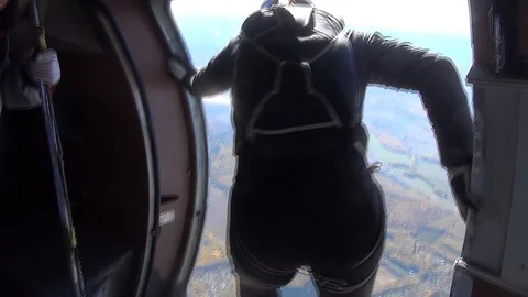 Skydivers Jumping From The Airplane at 1500 meter in sunny day Stock Footage 105424960