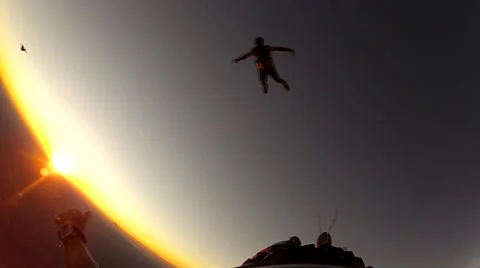 Skydivers at the sunset Stock Footage 54218068