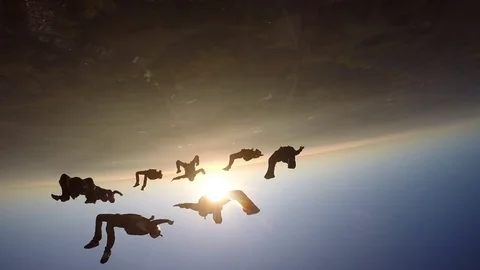 Skydivers at the sunset Stock Footage 81495969