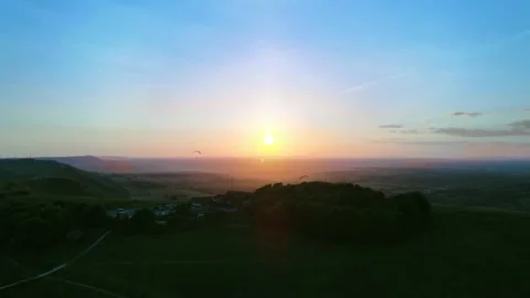 Skydivers in sunset Stock Footage 151031067