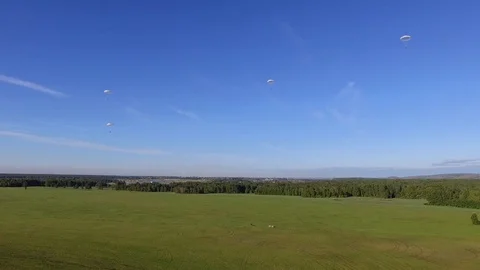 SkydiversApproaching to the Ground Stock Footage 95777653