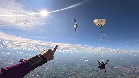Skydiving airplane diving after dropping skydivers Stock Footage 327974084