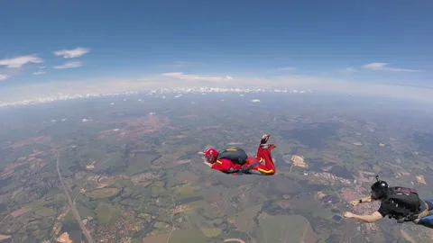 Skydiving coach instructor and student. Having fun at the skies. Stock Footage 145021099