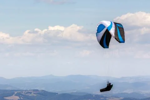 Skydiving  extreme over the mountains Stock Photos