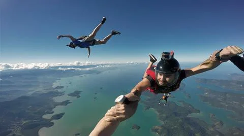 Skydiving first person view. Stock Photos