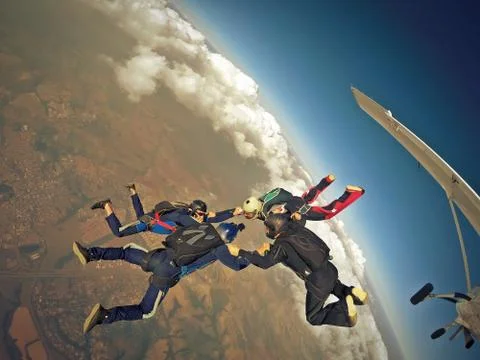 Skydiving four way team formation Foto stock