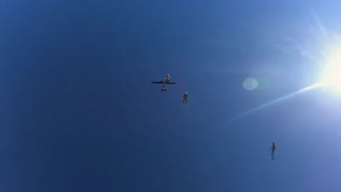 Skydiving, free fall, a man in the clouds, parachutists jump out of an airplane Stock Footage 172089086