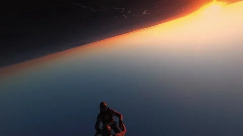 Skydiving, free fall, a man in the clouds, parachutists jump out of an airplane Stock Footage 172089154