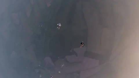 Skydiving, free fall, a man in the clouds, parachutists jump out of an airplane Stock Footage 172089160
