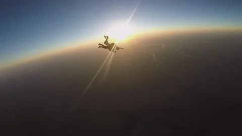 Skydiving, free fall, a man in the clouds, parachutists jump out of an airplane Stock Footage 172089185