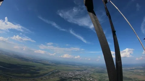 Skydiving, free fall, a man in the clouds, parachutists jump out of an airplane Stock Footage 172089237