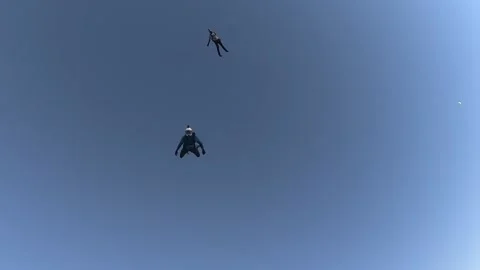 Skydiving, free fall, a man in the clouds, parachutists jump out of an airplane Stock Footage 172089252