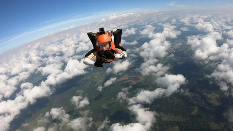 Skydiving. Girl is deploying a parachute. Vidéo 108734087