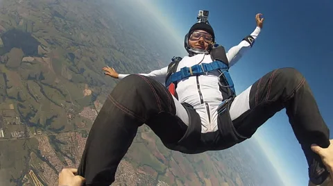 Skydiving girl having fun Vídeos de archivo 57210744