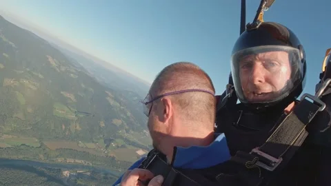 Skydiving. Happy Instructor and student or tourist. Stock Footage 146821476