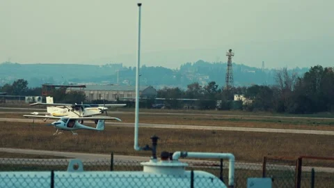 Skydiving jump plane arrives to load up a group of skydivers. Stock Footage 220221254