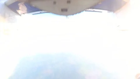 Skydiving. Jumping out. Stockbeeldmateriaal 90274330