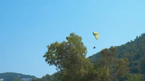 Skydiving with parasailing on bay. Video stock 238951341
