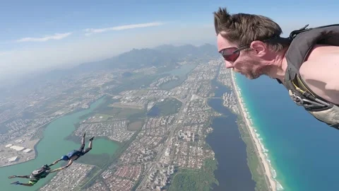 Skydiving selfie over the beach 스톡 동영상 217556001