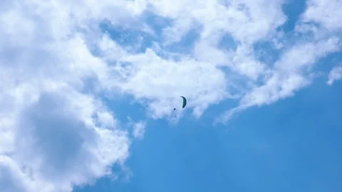 Skydiving soaring above sea Stock Footage 250490880